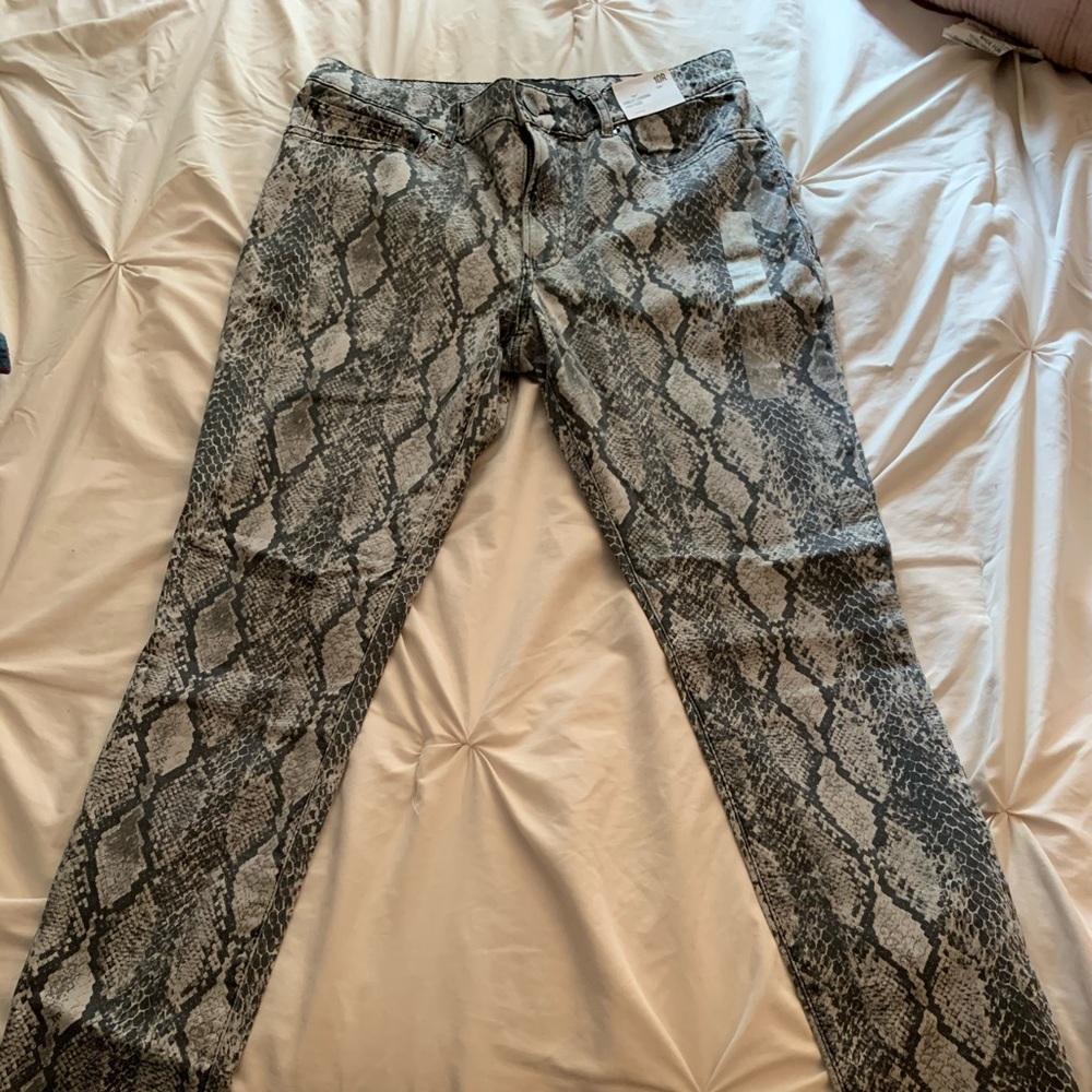 Snake print high rise jeggings